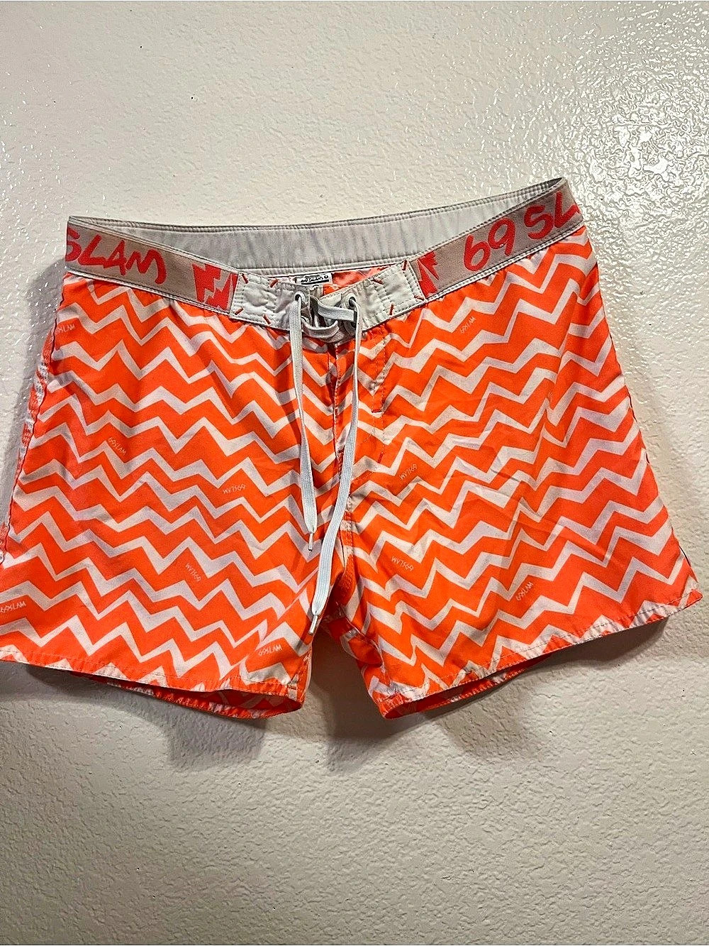 69 slam Men's Orange Geometric Swim Trunks